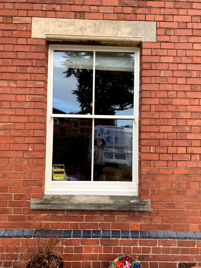 Red brick sash window in Herefordshire